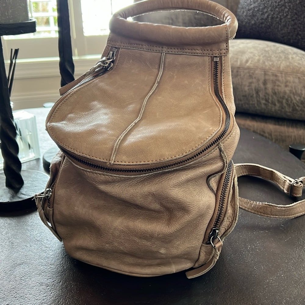 Cut n’ Paste Distressed Leather Backpack